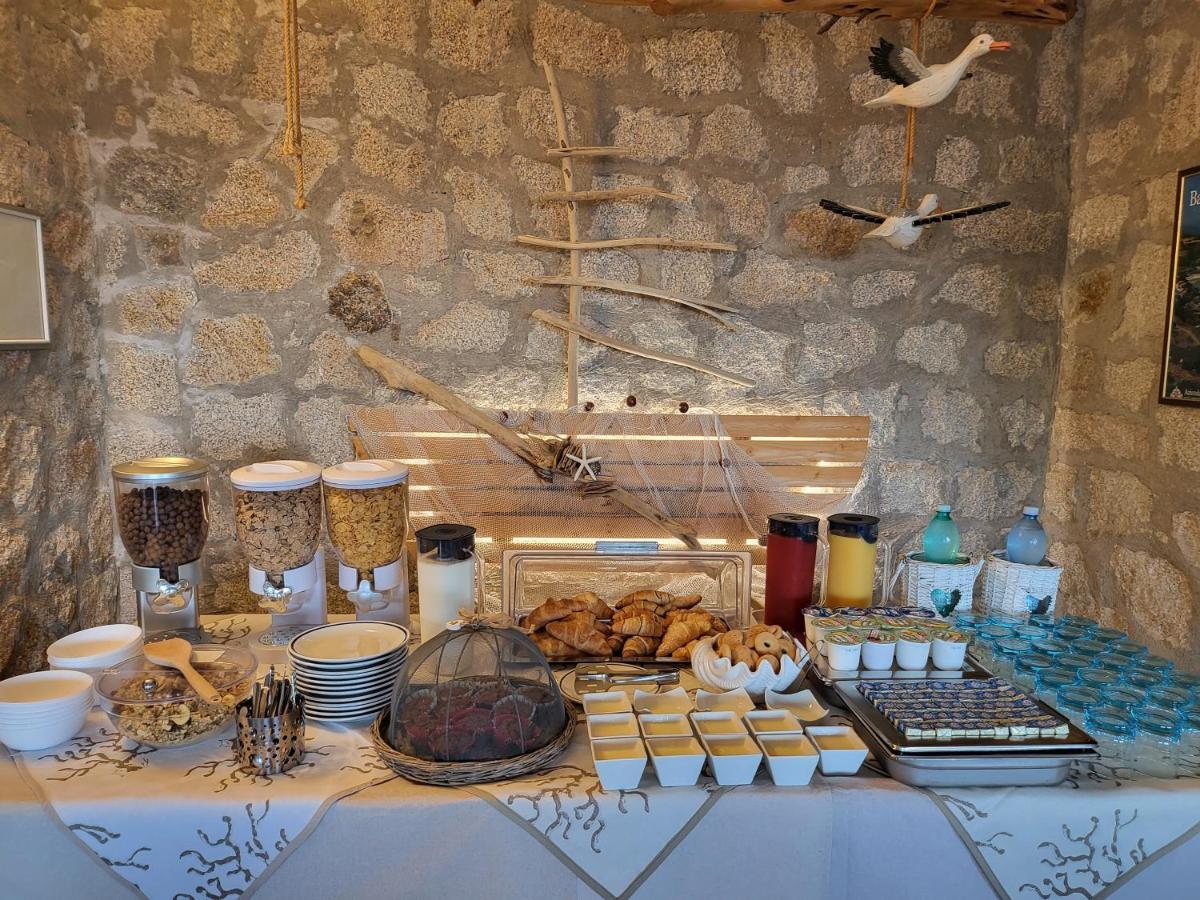 Hotel Olimpia Baja Sardinia Extérieur photo